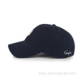 unisex navy blue dad hat with embroidered logo